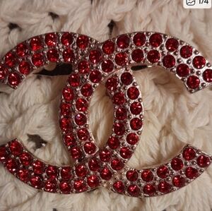 Gold Brooch with Red Accents